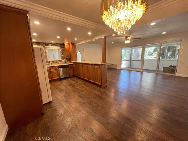 Custom chandelier in the dining area located between the kitchen and living room.
