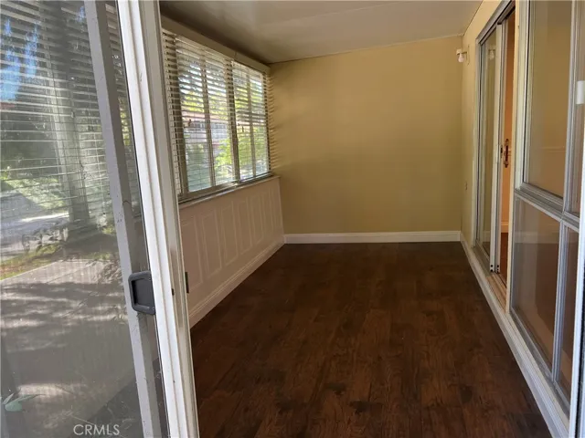Spacious enclosed patio room adds extra living space.