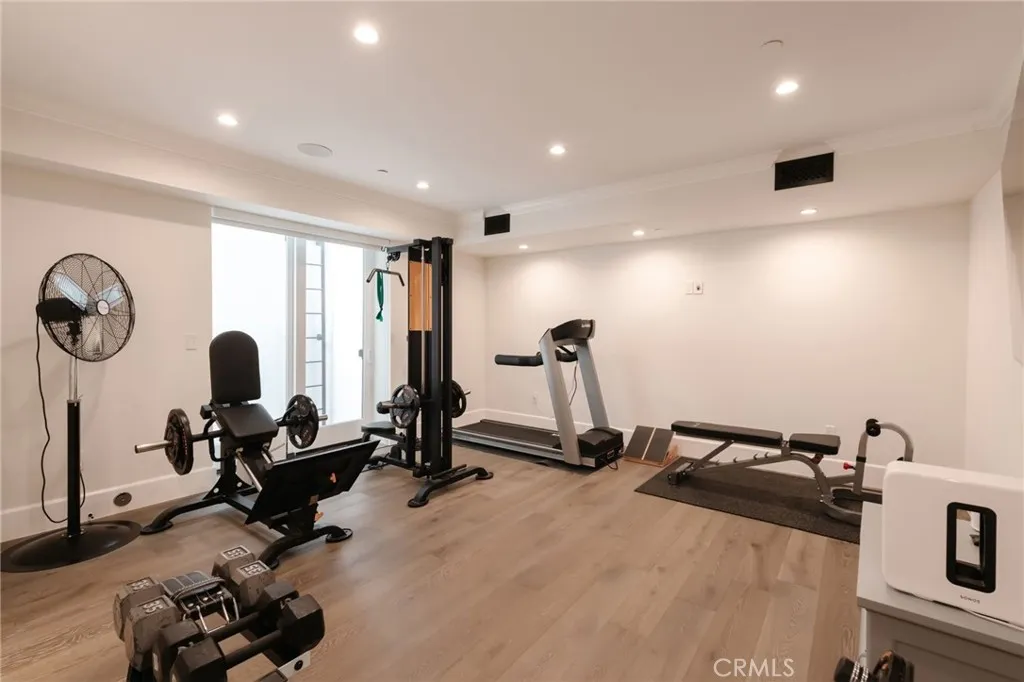 Bottom floor bed is being used as a gym