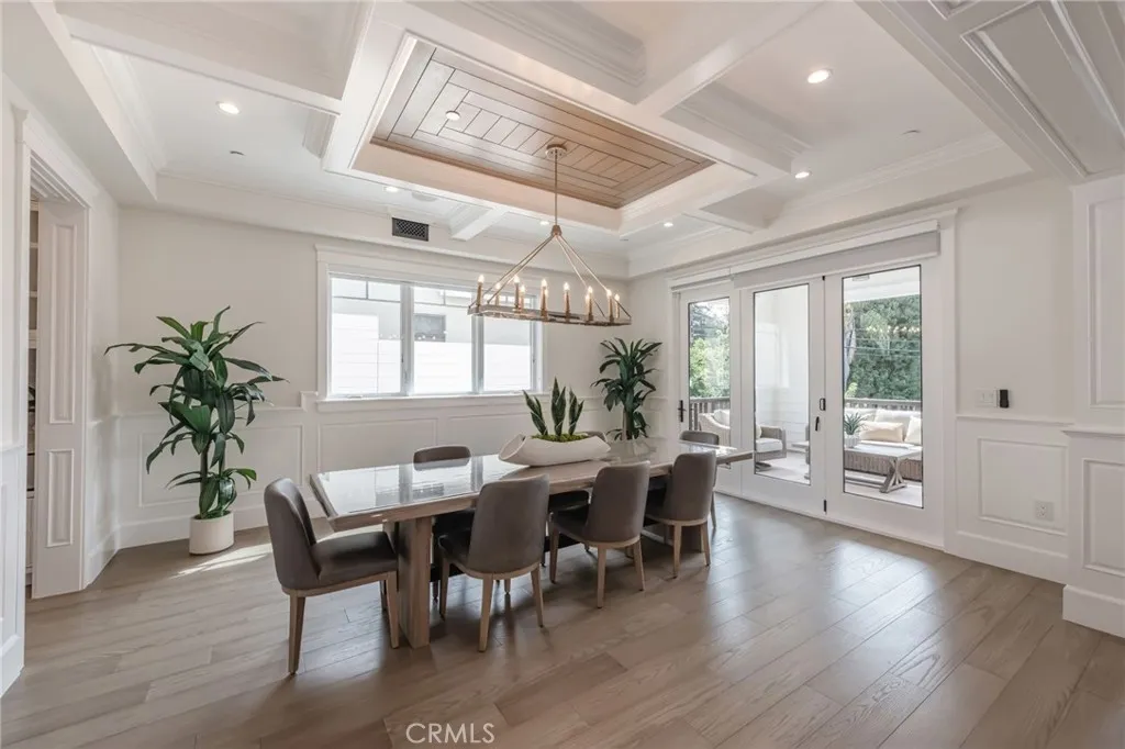 Accordion doors from the dining room open up to a covered patio area!