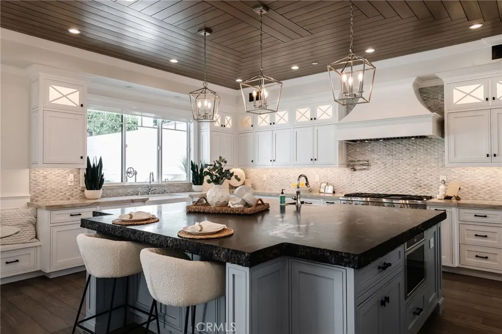 Chef's kitchen is breathtaking and equipped with Thermador Appliances