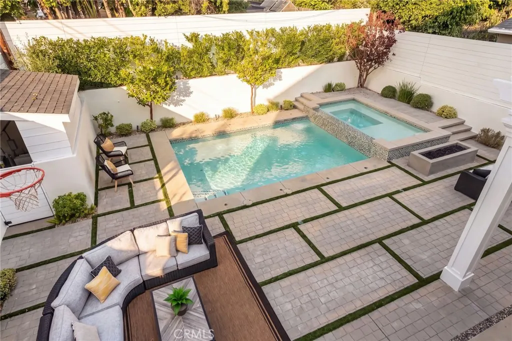 View of the dream backyard from the primary bedroom balcony