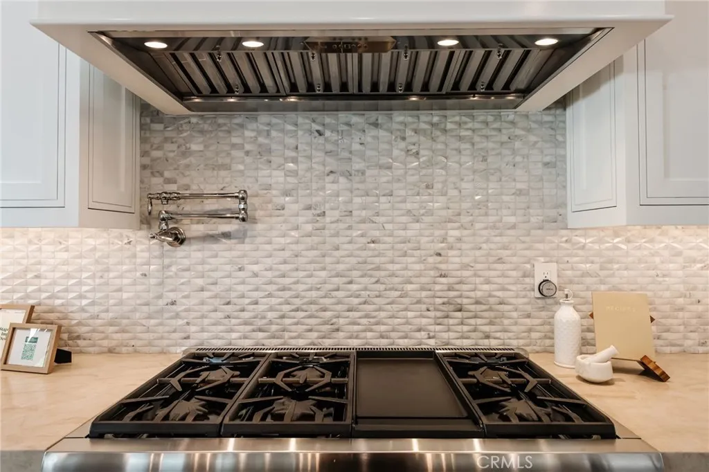 Thermador Chef's Stove with oversized vent hood
