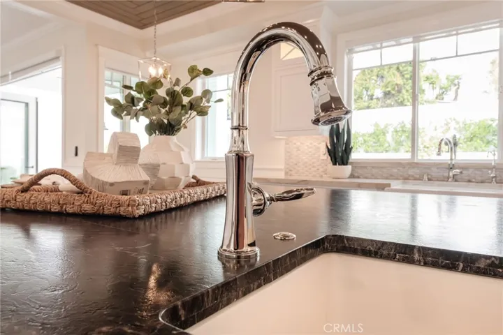 Veggie wash and deep sink are built into the island.