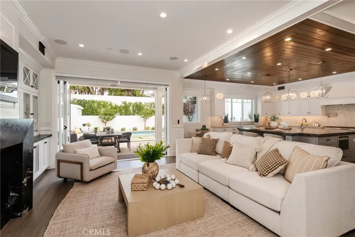 Expansive doors open up from the living room to the ultimate backyard escape!
