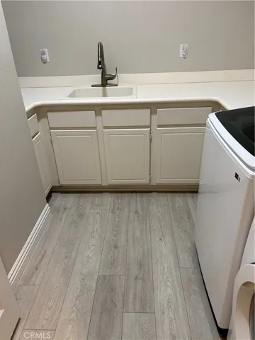Laundry Roon showing the Sink & good Counter Space.