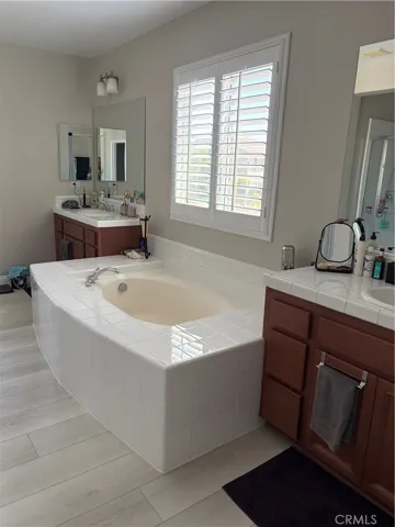 Master Bath with Dual Sinks & Large Tub.