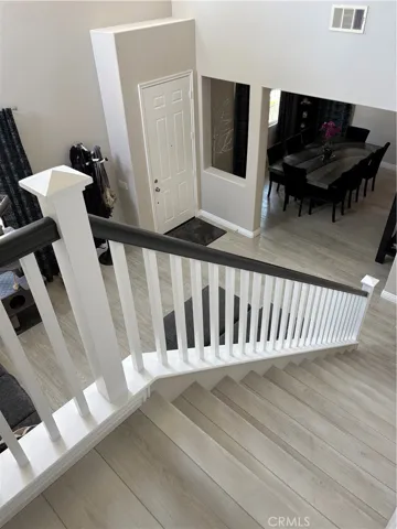 Stairway from First Floor to Second Floor with 4 Bedrooms & 3 Full Bathrooms plus Bonus Room being used as a Bedroom also.