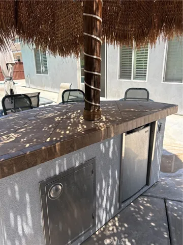 Built-in Fridge & Bar-B-Q islands by Pool Area.