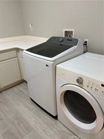 Laundry Room with good counter space. The Elect. Washer & Gas Dryer, Do Not Stay.