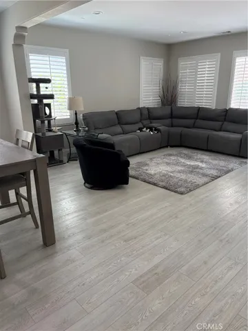 Great Room with Casual Dining, Wrap around Sofa & Chair.