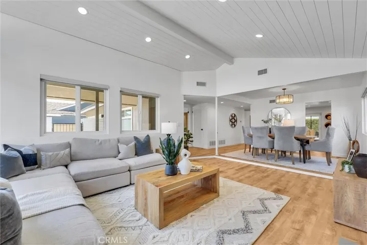 Living room flows beautifully into the dining area.