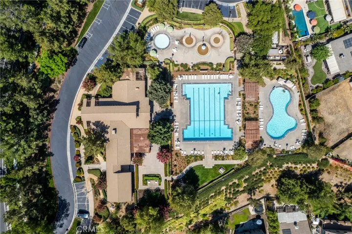 Bird's-eye view of the resort-style community pools and recreation facilities.
