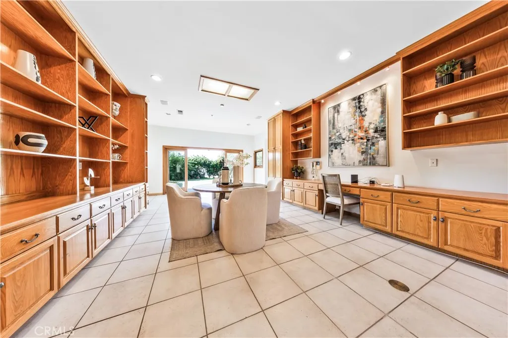 Huge recreation room with sliding glass doors providing direct access to the side yard. Huge recreation room with sliding glass doors providing direct access to the side yard.