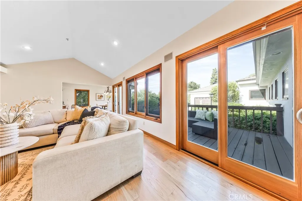 Bright and spacious family room with a sliding glass door that opens directly to the deck. Bright and spacious family room with a sliding glass door that opens directly to the deck.