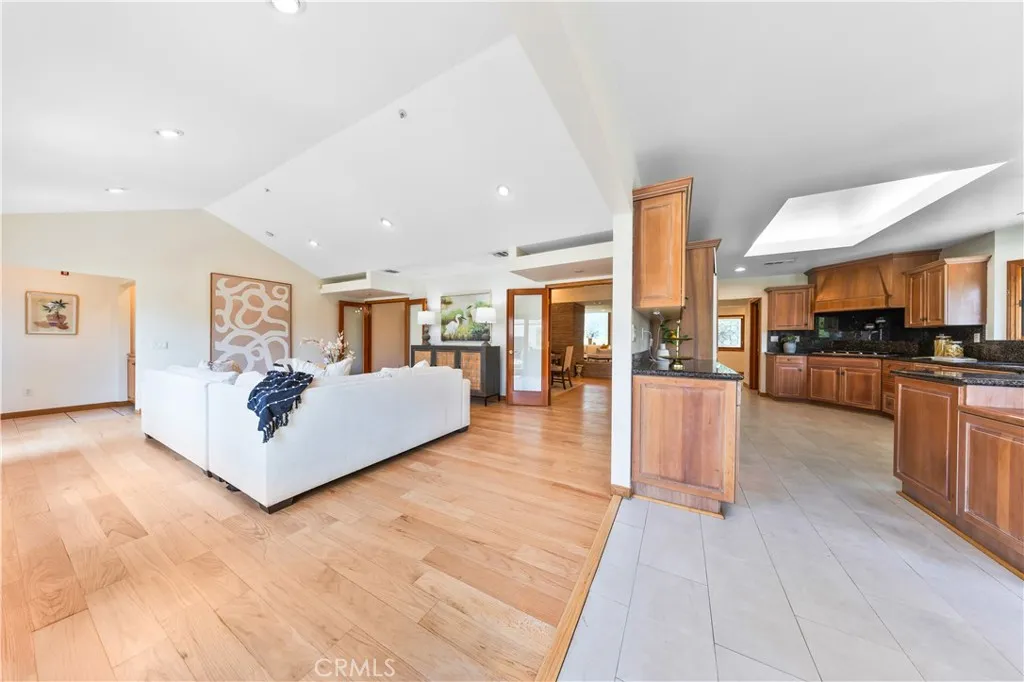 The spacious family room flows seamlessly into the open-concept kitchen. The spacious family room flows seamlessly into the open-concept kitchen.