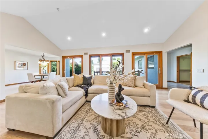 Bright and spacious family room with a sliding glass door that opens directly to the deck.