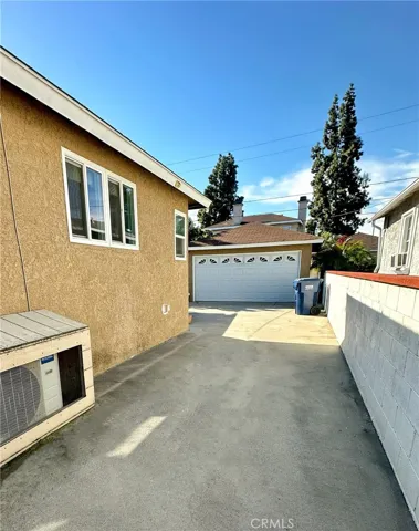 Driveway to back yard and garage