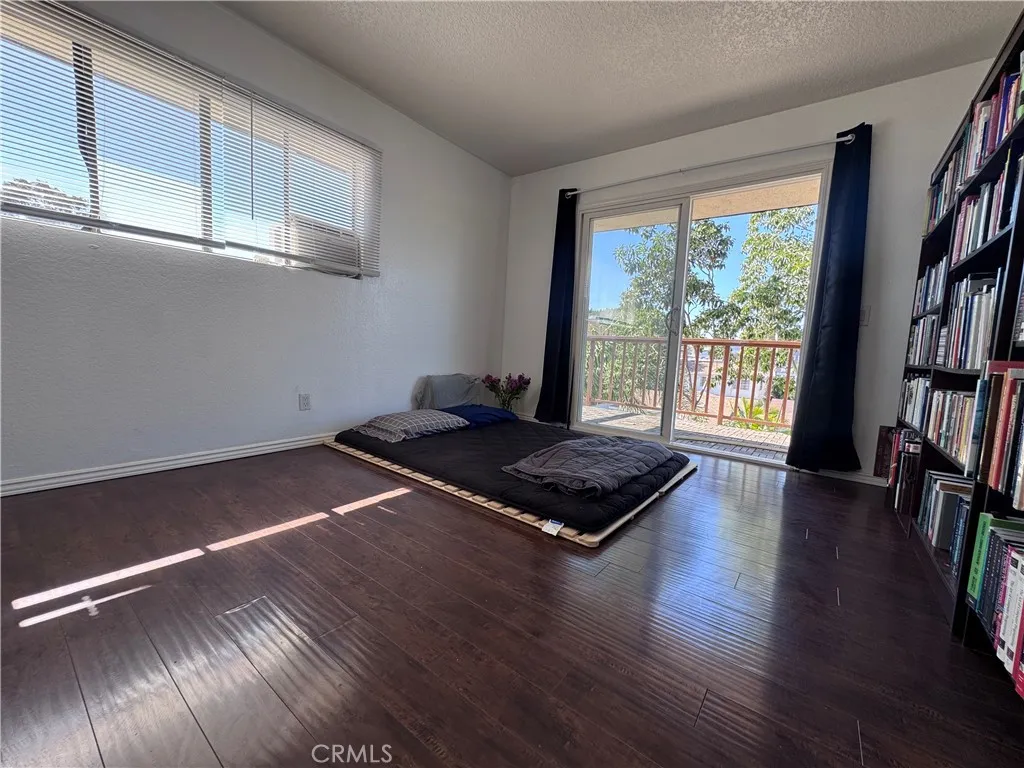 Large, bright bedroom with walk in closet