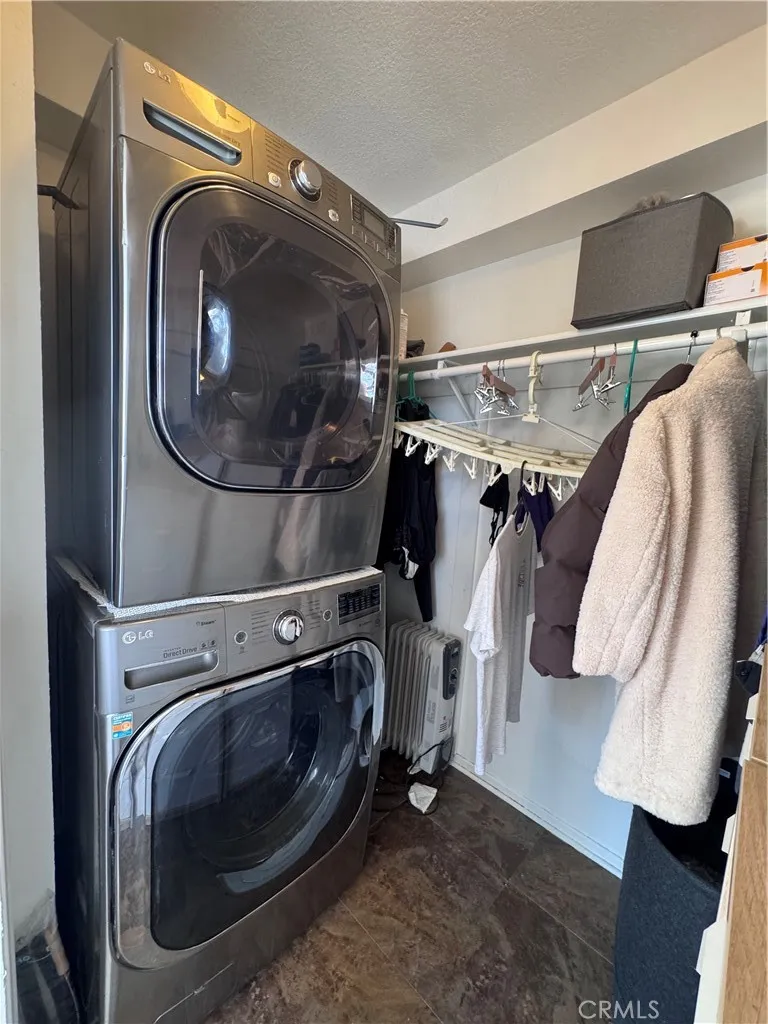Stackable washer and dryer in unit