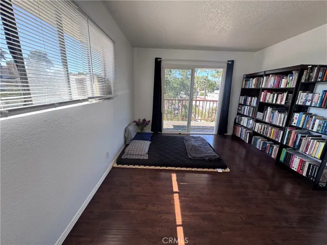Large, bright bedroom with walk in closet