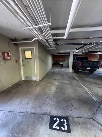 Two parking spaces, right near the entrance to the garage