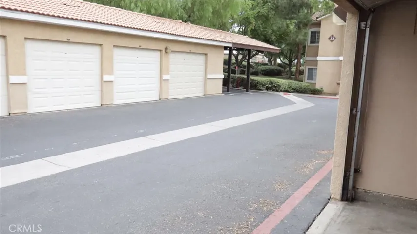 Covered parking spot- view from garage