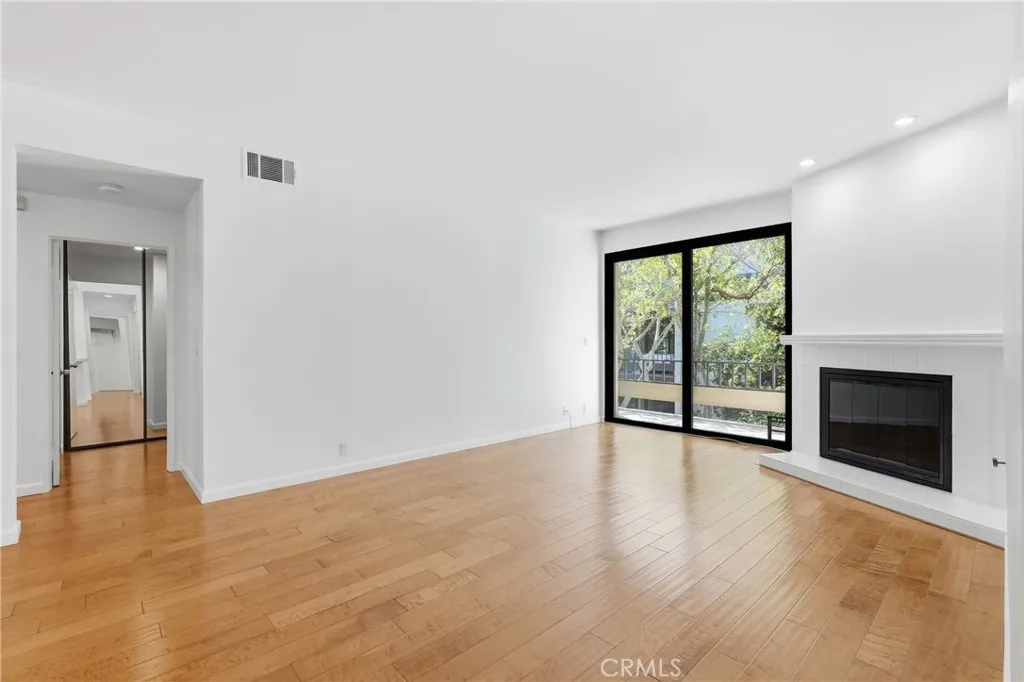 Looking across living room from kitchen entrance