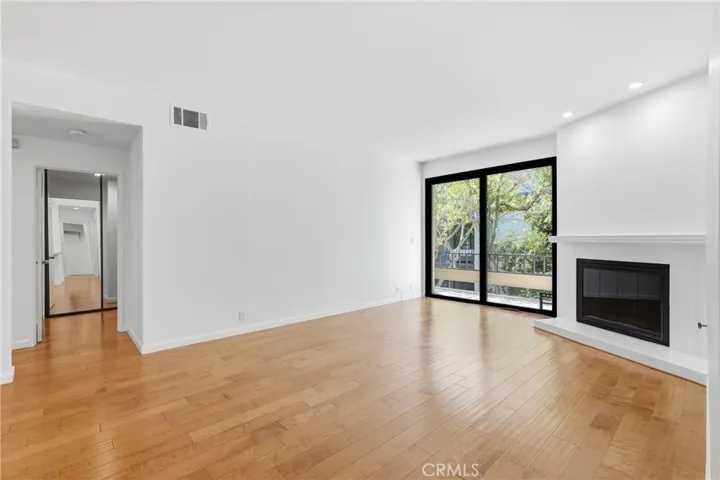 Looking across living room from kitchen entrance