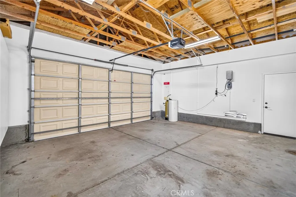 Two car garage with water softener system for the home