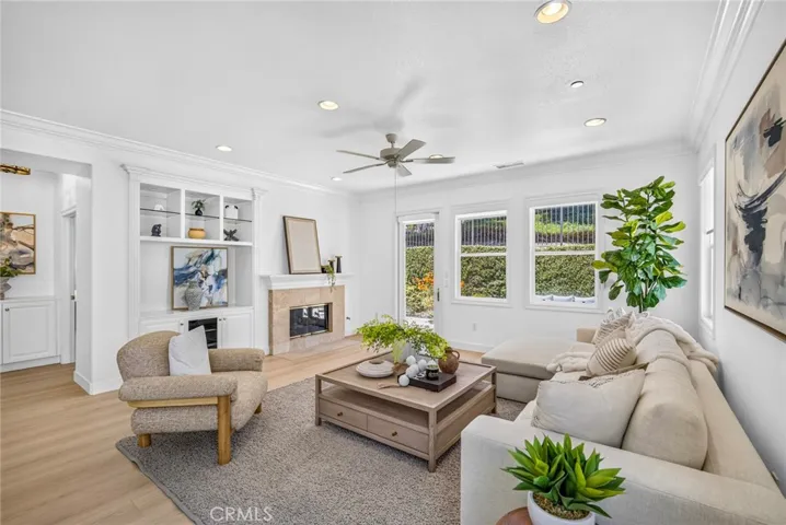 family room with lots of natural light and fireplace