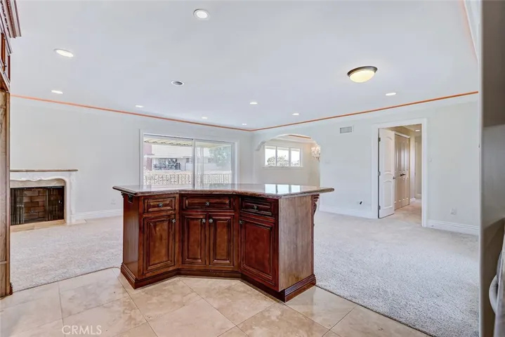 Kitchen overlooks living area