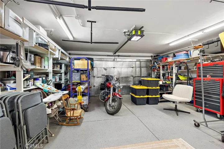 2 car finished garage with epoxy and shelving