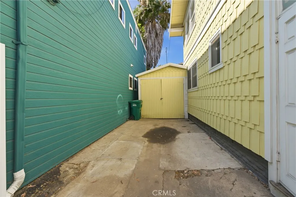 Driveway leading to one-car Garage