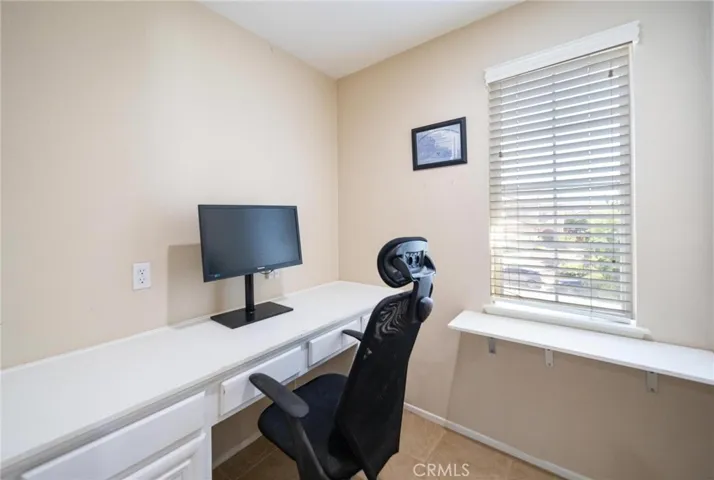 Small office space in loft with doorway