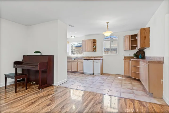 Living room opens to dining area and kitchen