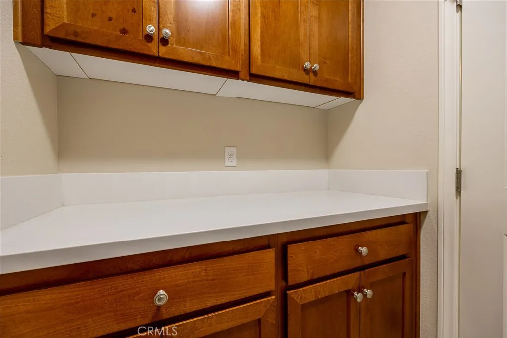 Folding counter and plenty of cabinets for storage.