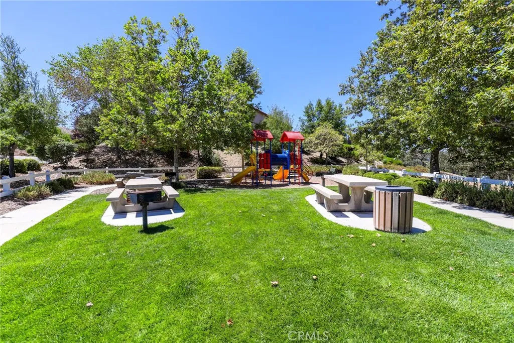 Las Lomas has a wonderful park complete with picnic tables, grass, shade trees and a play structure.
