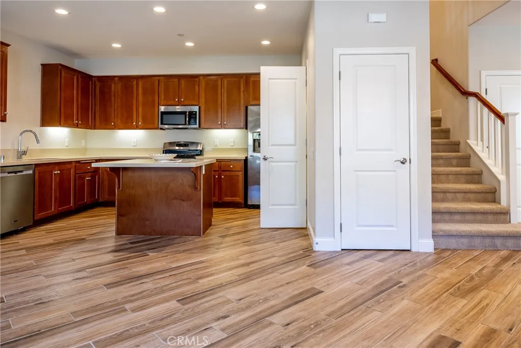 Adjacent to the living room is the well appointed kitchen.