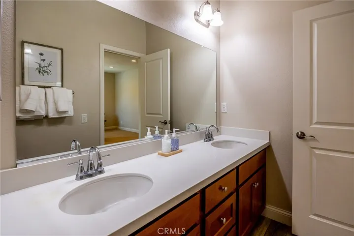 The main bathroom offers a dual sink vanity.