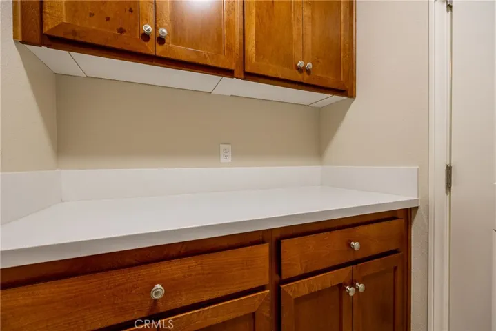 Folding counter and plenty of cabinets for storage.
