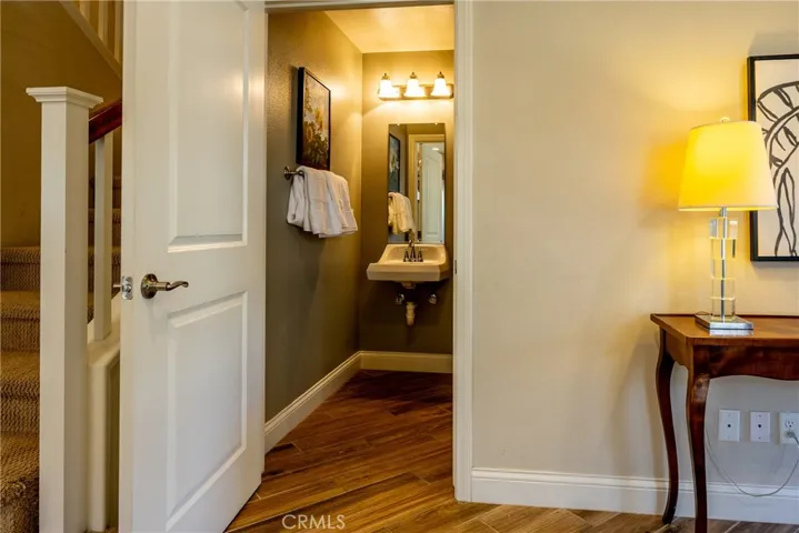 Directly off the dining room is a convenient half bathroom.