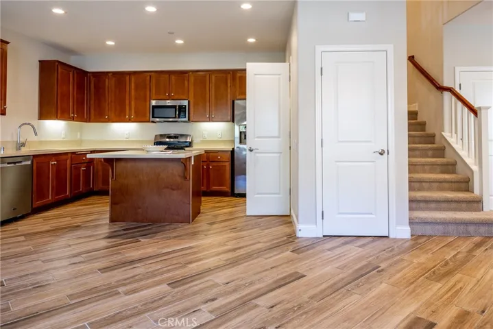 Adjacent to the living room is the well appointed kitchen.