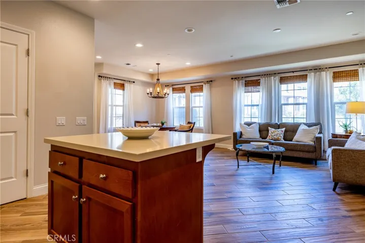 The kitchen is highlighted by a center island which provides additional seating and storage.