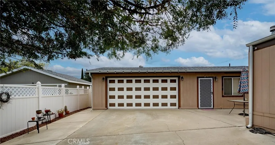 Garage and Entrance to 3rd Bedroom from Door to the right of the Garage.