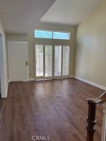 Livingroom with sliders to patio