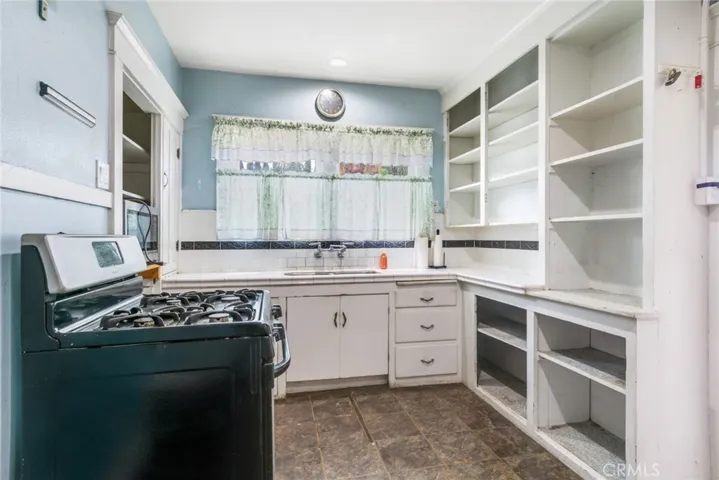 Kitchen with 4 Burner Stove and Microwave
