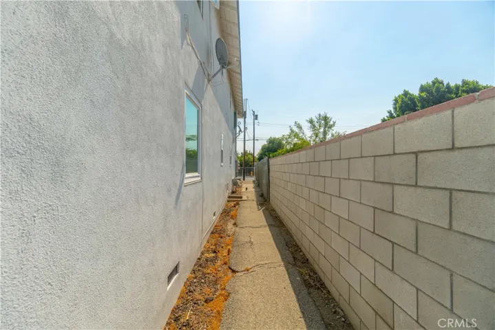 Views of block wall along the south side of property