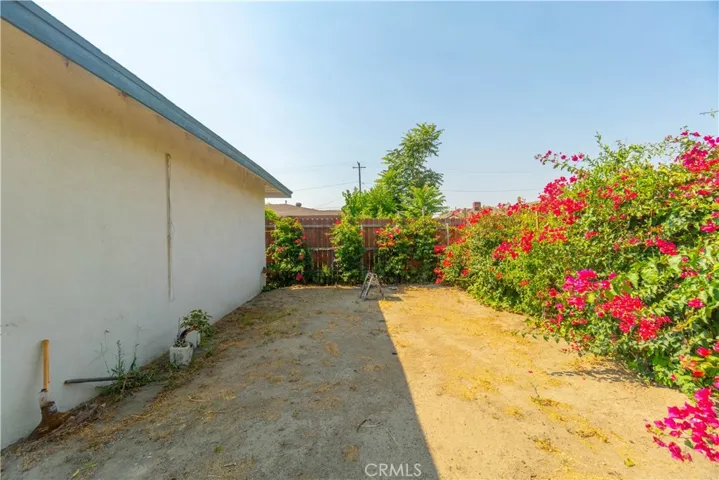 Extra space for parking West side of 4 detached garages