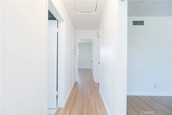Hallway with large storage cabinets